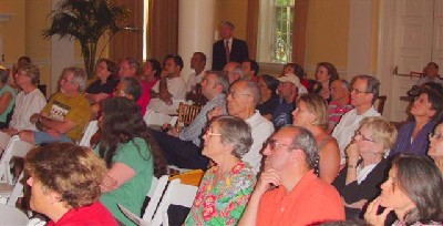 Residents attand a briefing in the Ballroom